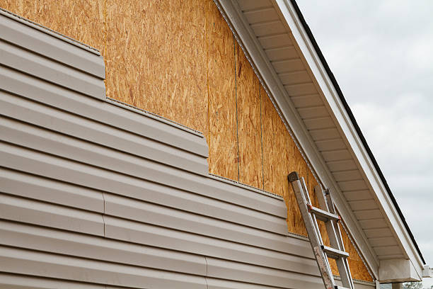 Professional Emergency Siding Repair technician working in Harrisville, PA